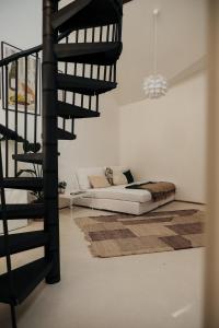 Ένα ή περισσότερα κρεβάτια σε δωμάτιο στο Urban Loft - Appartment in ehemaliger Fabrik zentral in Landau