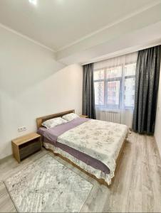 Postel nebo postele na pokoji v ubytování Duet + 6 fotografií
