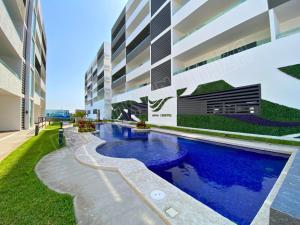 Bazén v ubytování Condominios Marina Cerritos 1 nebo v jeho okolí