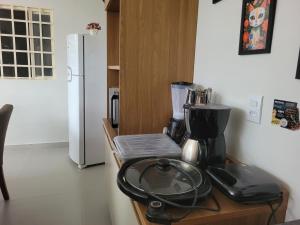 Mynd úr myndasafni af Casa funcional - 02 quartos, 02 camas de casal, 01 cama de solteiro, cozinha gourmet e garagem para carro pequeno í Ji-Paraná