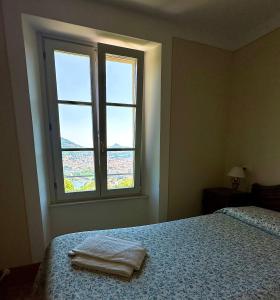 Postel nebo postele na pokoji v ubytování Villa Corti Lakeview