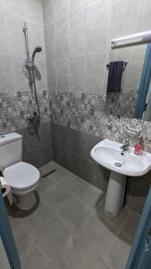 Koupelna v ubytování Cozy Apartment Mahdia, good location + 8 fotografií