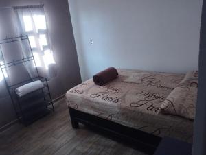Postel nebo postele na pokoji v ubytování Jacarandas