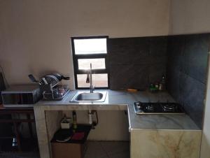 Una cocina o cocineta en Jacarandas