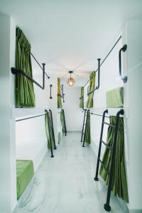 Ένα ή περισσότερα κρεβάτια σε δωμάτιο στο Qantic Lodging & Rooftop