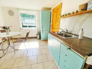 Kuchyň nebo kuchyňský kout v ubytování Apartmán Buchlovice
