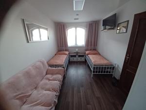 Łóżko lub łóżka w pokoju w obiekcie Ubytování pod Pálavou