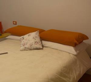 A bed or beds in a room at Agriturismo Nonna Bettina