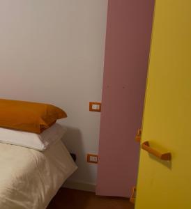 A bed or beds in a room at Agriturismo Nonna Bettina