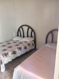 Hotel Ouro Fino客房内的一张或多张床位
