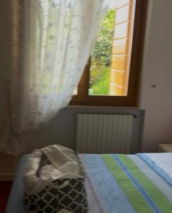 A bed or beds in a room at Agriturismo Nonna Bettina