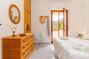 Ένα ή περισσότερα κρεβάτια σε δωμάτιο στο Villetta see view, terrace, garden