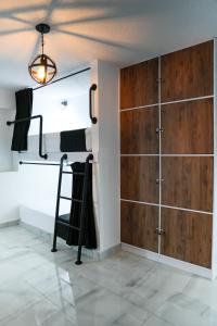 Ένα ή περισσότερα κρεβάτια σε δωμάτιο στο Qantic Lodging & Rooftop