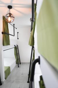 Ένα ή περισσότερα κρεβάτια σε δωμάτιο στο Qantic Lodging & Rooftop
