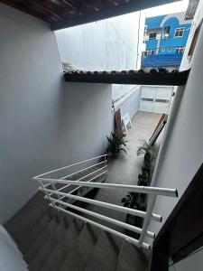 an overhead view of a staircase in a building at Apartamento em Jequié para São João in Jequié