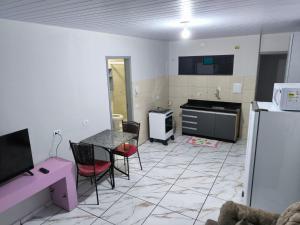 TV a/nebo společenská místnost v ubytování Apartamentos Rio Parana + 3 fotografie