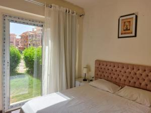 Voodi või voodid majutusasutuse porto sharm 2 bed room and private garden-pool view toas