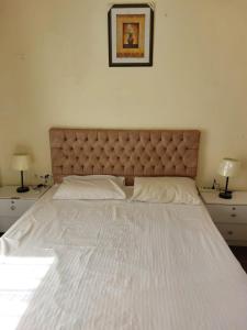 Voodi või voodid majutusasutuse porto sharm 2 bed room and private garden-pool view toas