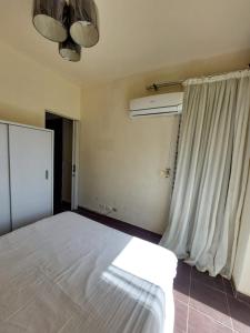 Voodi või voodid majutusasutuse porto sharm 2 bed room and private garden-pool view toas