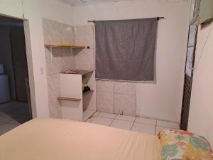 Ένα ή περισσότερα κρεβάτια σε δωμάτιο στο Apartamento completo em ótima localização