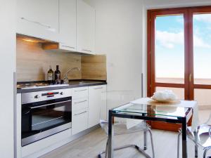O bucătărie sau chicinetă la Residence Frascati