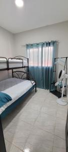 Katil atau katil-katil dalam bilik di Monaco Aparments