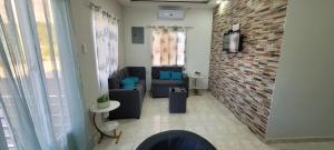 Ruang duduk di Monaco Aparments