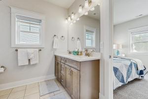 a bathroom with a sink and a mirror at Stingray Harbor --- 36 Stingray Drive in Ocean View +17 photos