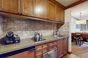 Kuchyň nebo kuchyňský kout v ubytování Everline Resort & Spa 340