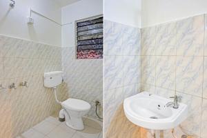 Koupelna v ubytování Hotel O Aru Sai