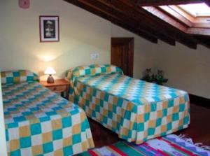 Postel nebo postele na pokoji v ubytování Casa del tablao