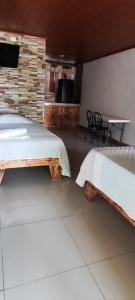 Postel nebo postele na pokoji v ubytování Hotel Maguey