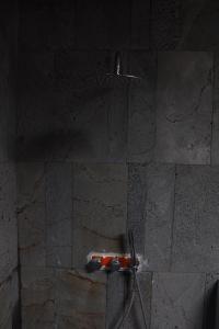 a shower in a bathroom with a shower at The Vu's Ha Giang in Lan Hung +82 photos