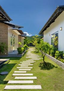 a walkway in the yard of a house at Parkview Villa Long Hai in Long Hai