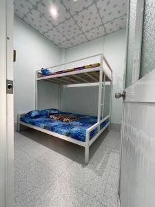 Postel nebo postele na pokoji v ubytování HOMESTAY Cát Tiên