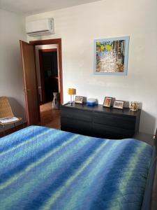 Posteľ alebo postele v izbe v ubytovaní Apartment F24 Stignano Favaco