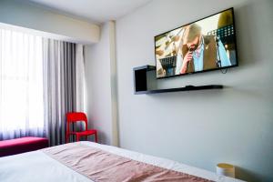 TV a/nebo společenská místnost v ubytování Apart Hotel Petit Palace Suites