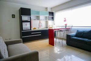 Kuchyň nebo kuchyňský kout v ubytování Apart Hotel Petit Palace Suites