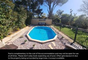 a pool is connected to the cost of the reconstruction and may be seen for us at Globe Trotters Homestay - room in shared private residence in Perth
