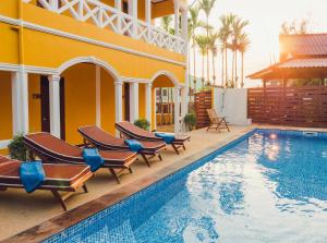 Bazén v ubytování Le Jardin Hotel nebo v jeho okolí