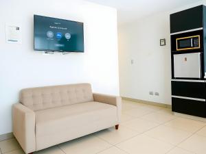 TV a/nebo společenská místnost v ubytování Apart Hotel Petit Palace Suites
