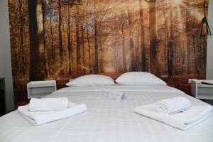 Postel nebo postele na pokoji v ubytování Apartmani Drijen