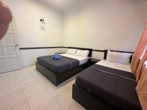 Katil atau katil-katil dalam bilik di 66 Semi-D Homestay