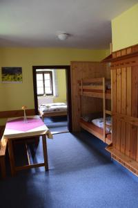 Ein Bett oder Betten in einem Zimmer der Unterkunft Penzion Ida