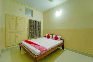 Ένα ή περισσότερα κρεβάτια σε δωμάτιο στο Super Hotel O SHER ऐ PUNJAB +23 φωτογραφίες