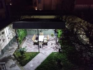 an overhead view of a patio with a table and chairs at Art Vesta in Yakkasaray