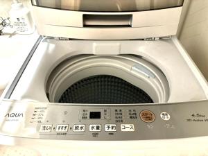 a close up of a toilet in a bathroom at Yama Hotel Akabane 201 in Tokyo