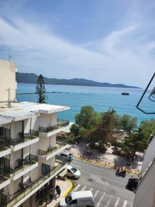 a view of the water from a building at Kalamata Apartment Beach Front in Kalamata