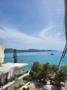 a view of the water from a building at Kalamata Apartment Beach Front in Kalamata