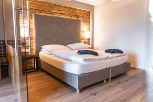 Postel nebo postele na pokoji v ubytování Maraias - Luxury Suites & Apartments